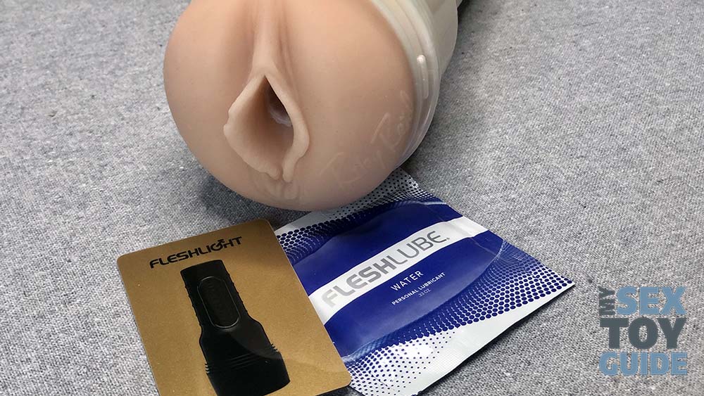 Closeup of the vagina opening with a Fleshlube satchet