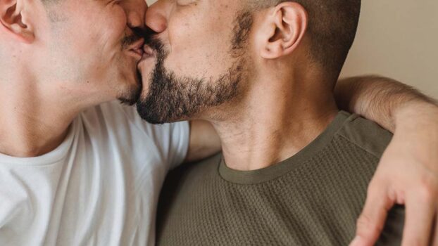 A gay couple kissing