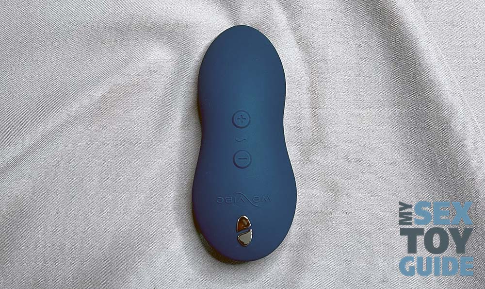 The top of We-Vibe Touch X with the control buttons and magnetic charger