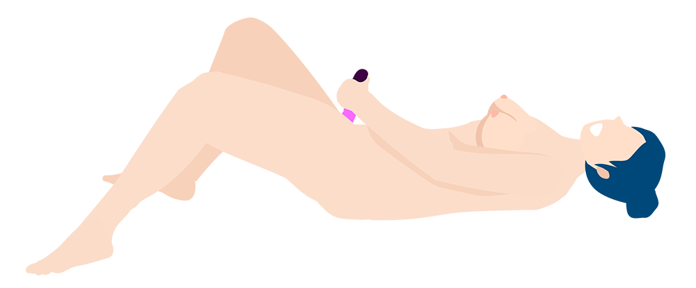 A woman using an egg vibe in missionary position