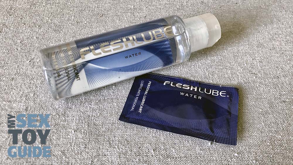 A bottle and sachet of Fleshlube
