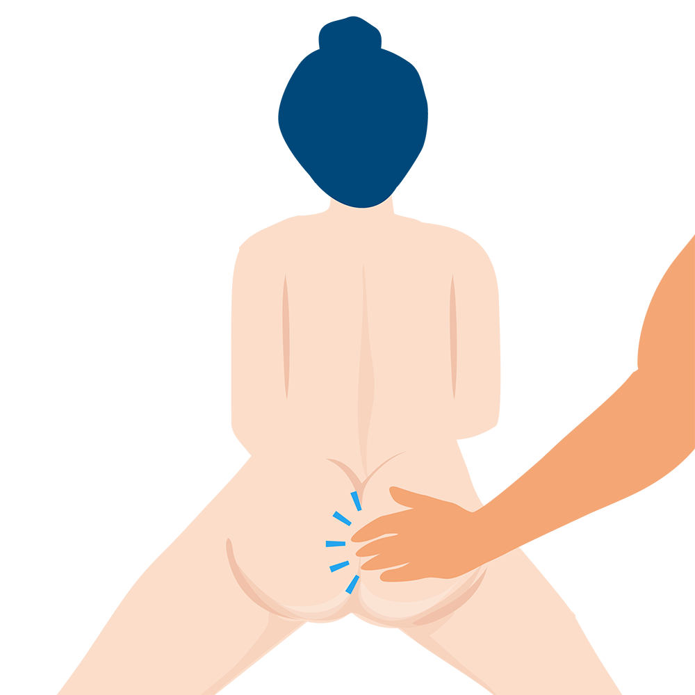 A man spanking a woman's butt