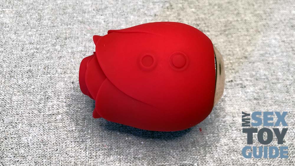 Closeup of the Rose toy's two control buttons