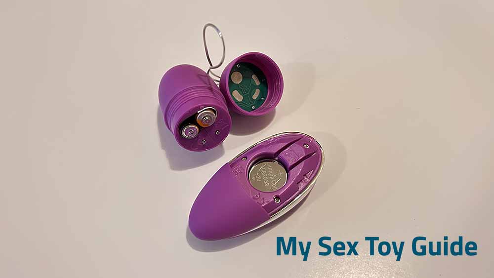 Lovehoney Thrill Seeker and the remote control with the battery compartments opened.