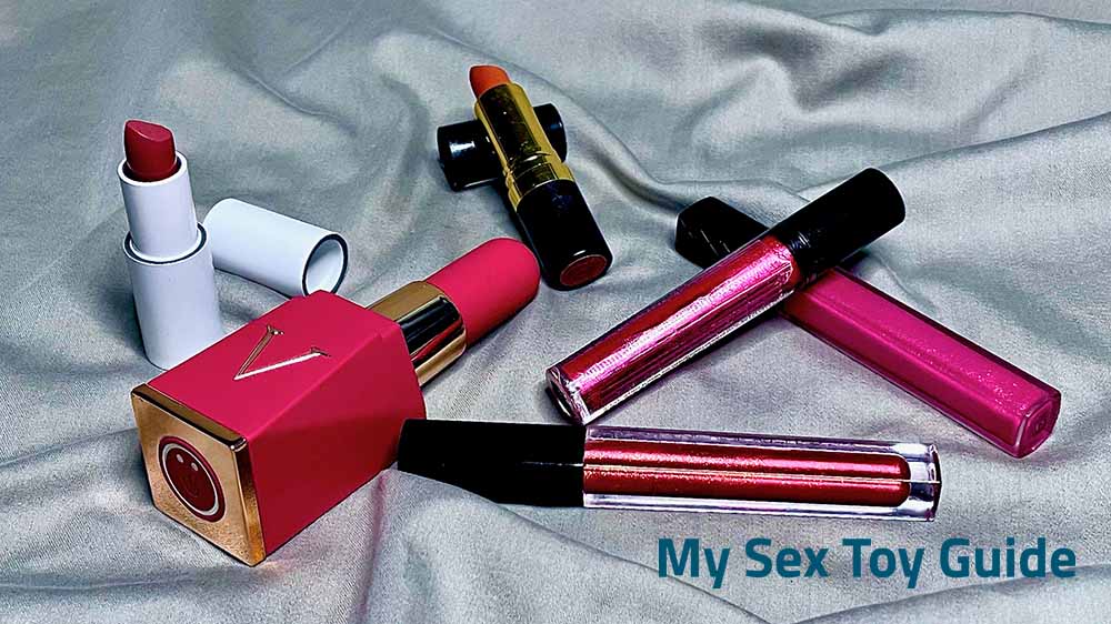 Boutique Voila Lipstick Vibrator next to some real lipstick makeup