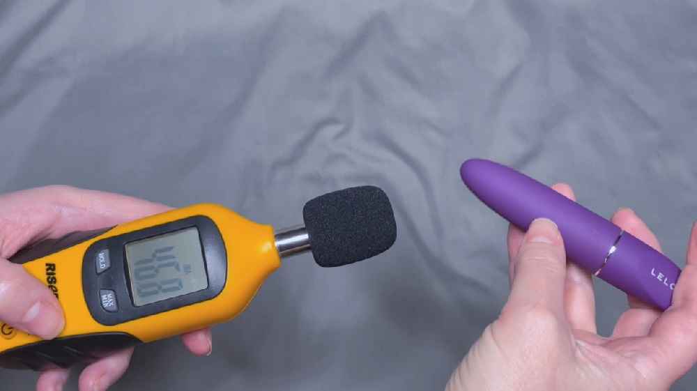 Me testing the sound level with a decibel meter