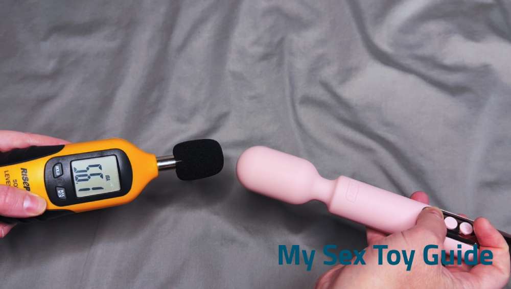 Me testing the sound level using a decibel meter