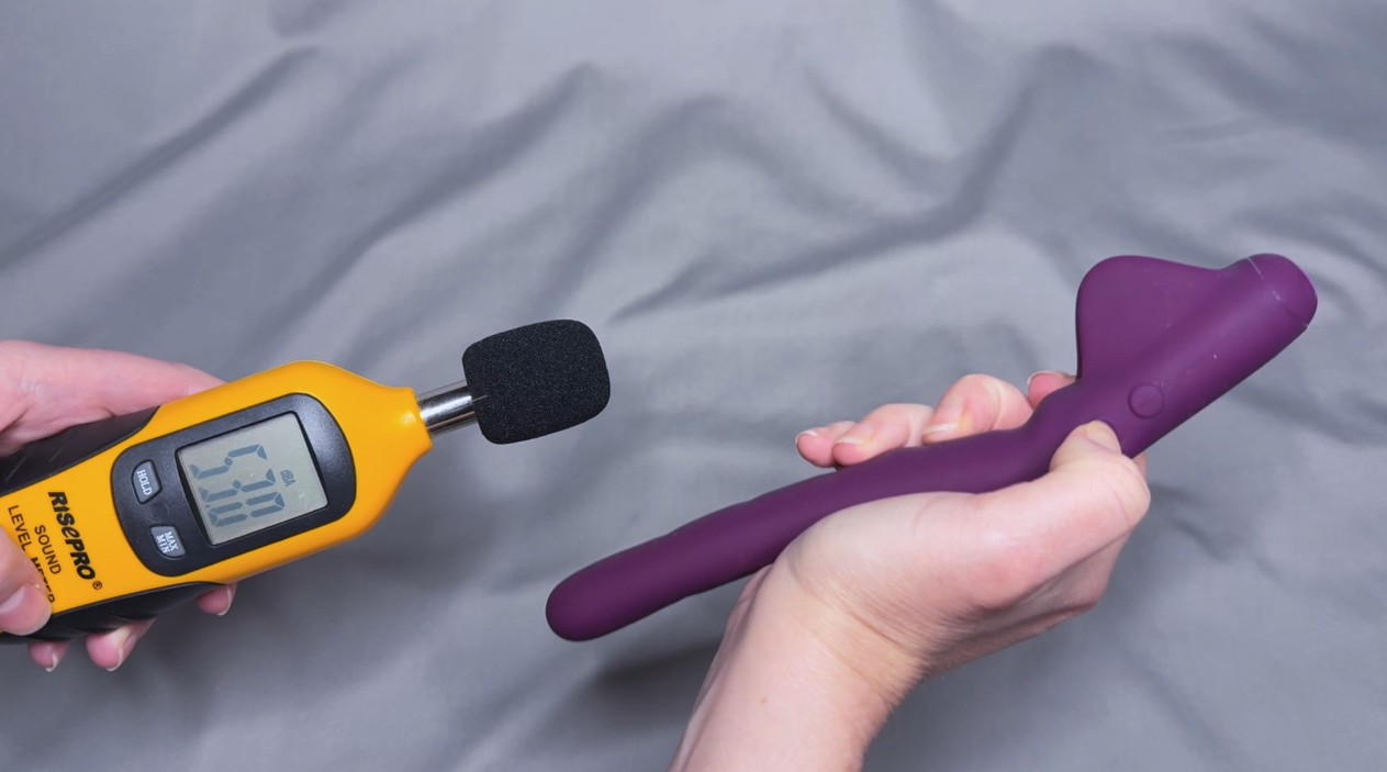 Me testing the sound level using a decibel meter