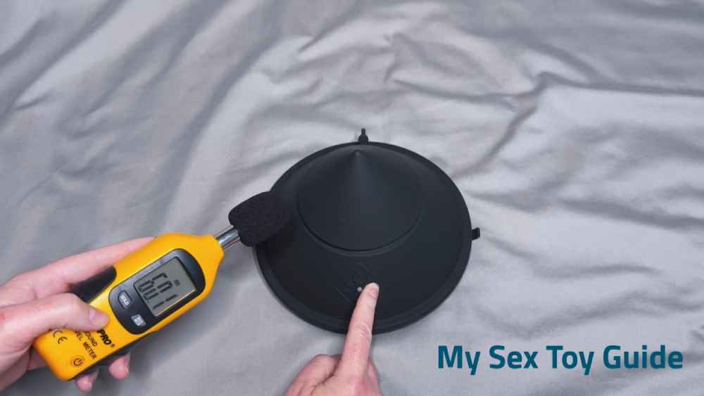 Me testing the sound level using a decibel meter