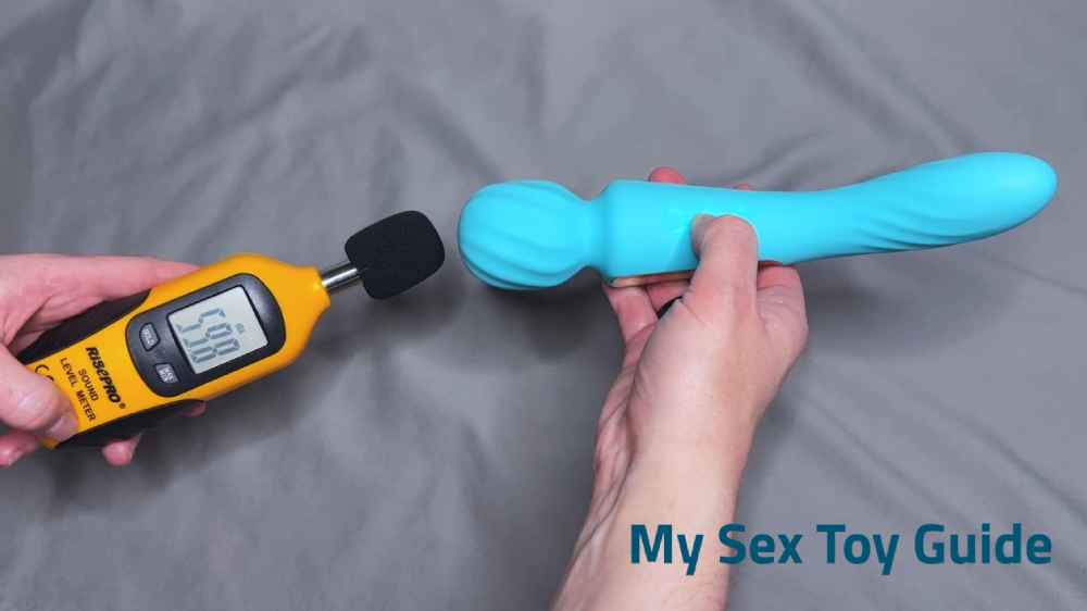 Me testing the sound level using a decibel meter