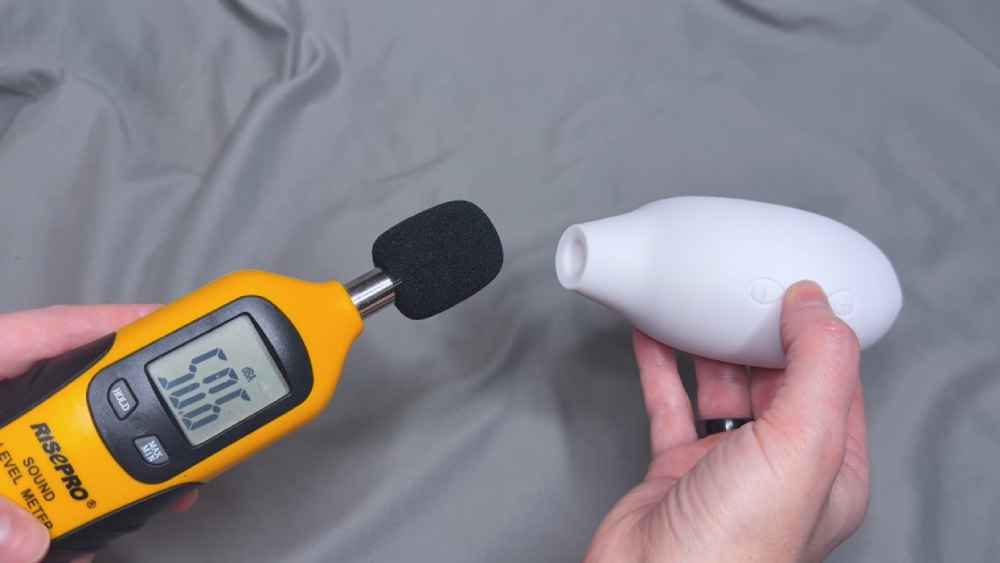 Me testing the noise level using a decibel meter