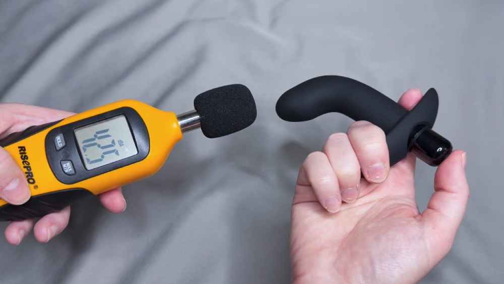 Me testing the sound level using a decibel meter
