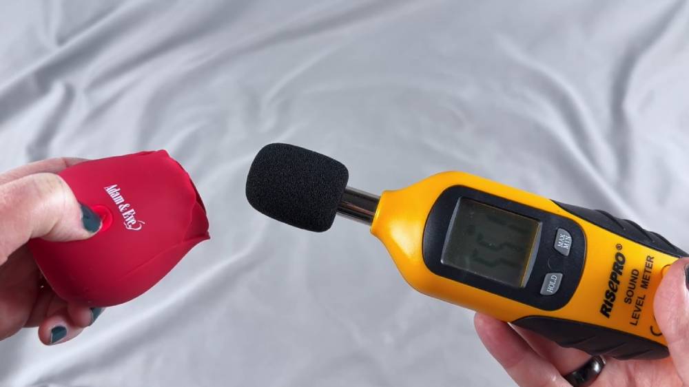 Me measuring the sound level using a decibel meter