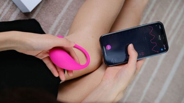 Woman using the Lovense Remote App