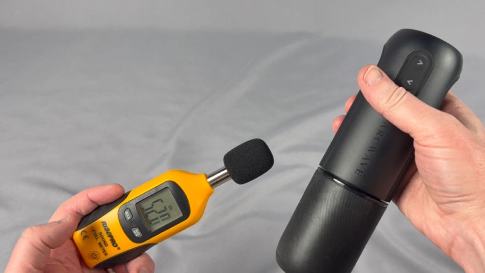 Me testing the sound level using a decibel meter