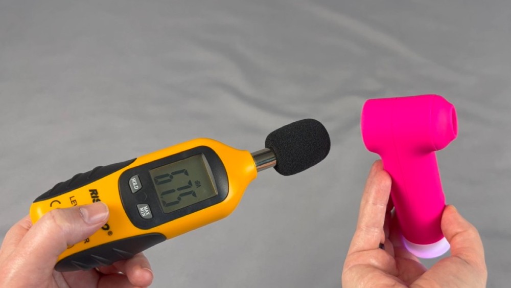 Me testing the sound level using a decibel meter