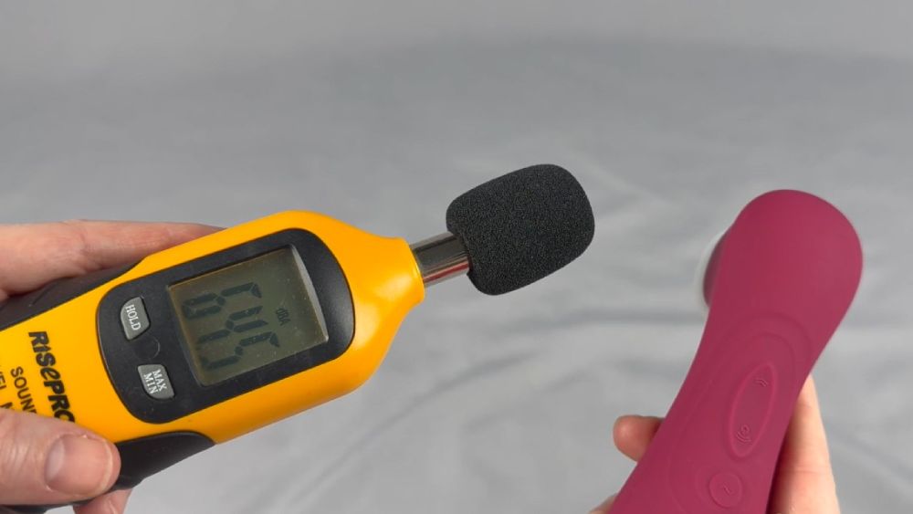 Me testing the sound level using a decibel meter
