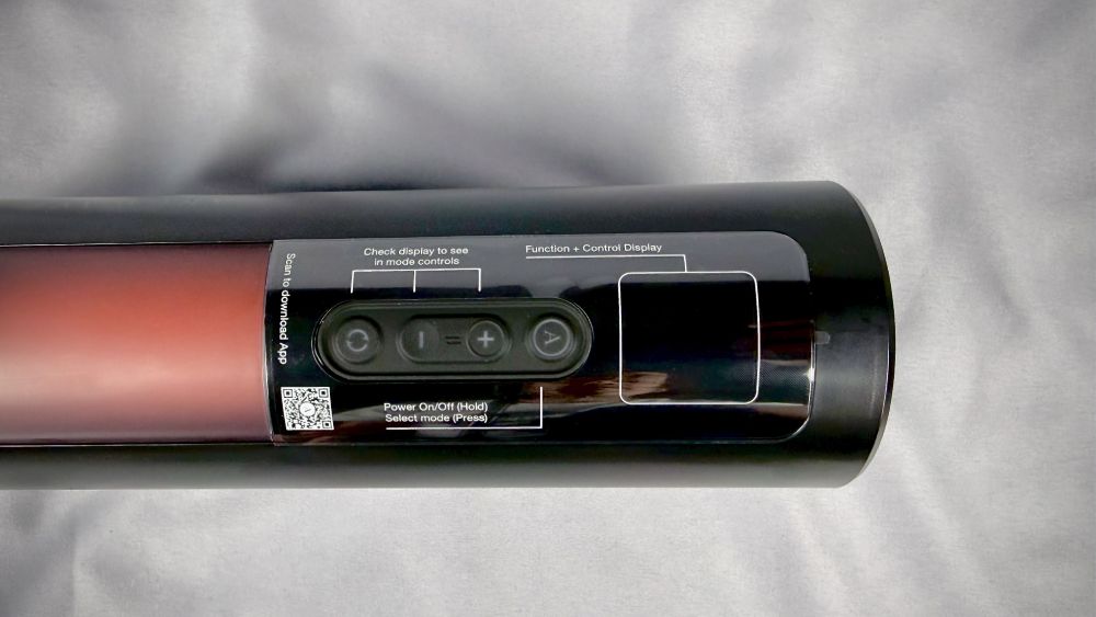 The sticker showing the functions of the control buttons