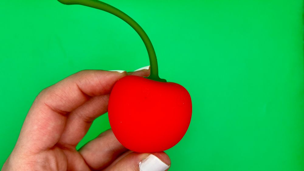 Me holding the Cherry Emojibator