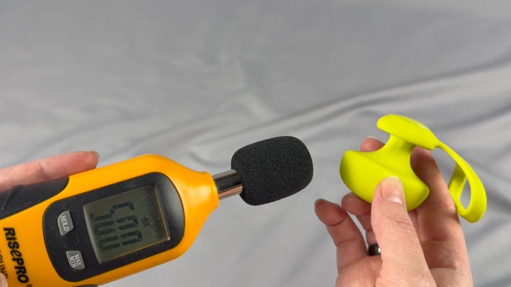 Me testing the sound level using a decibel meter