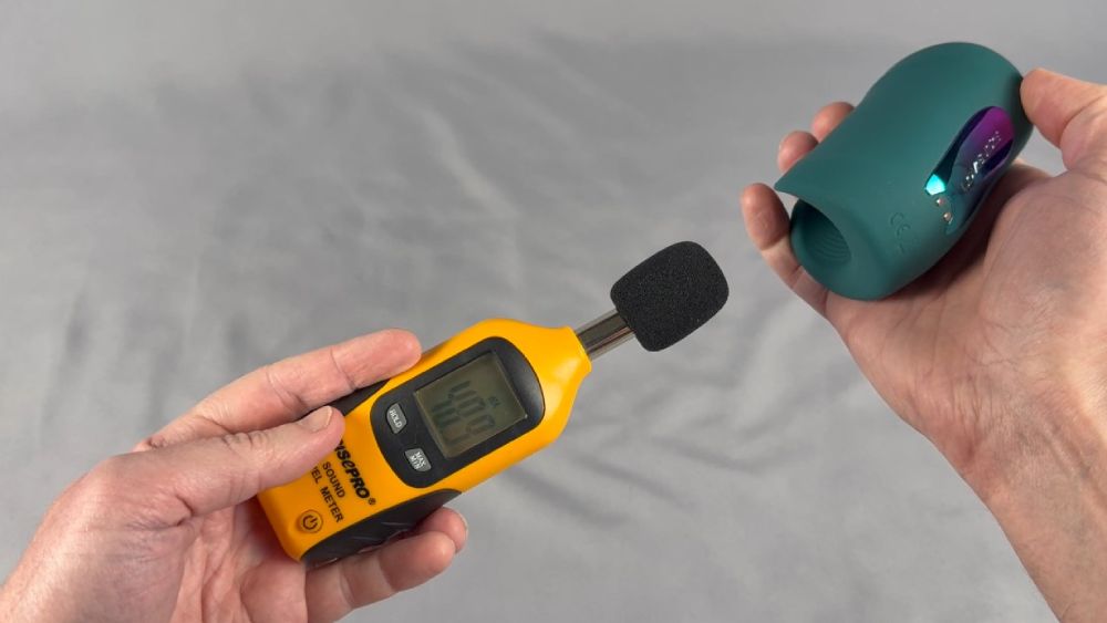 Me testing the sound level using a decibel meter