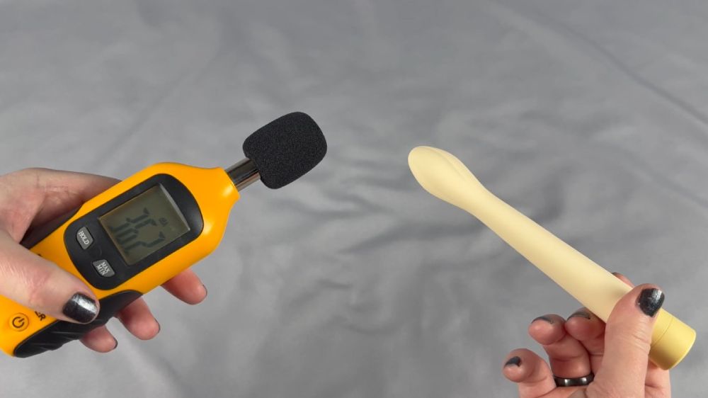 Me testing the sound level using a decibel meter